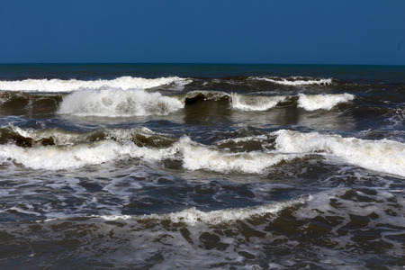 series of waves at the beachの写真素材