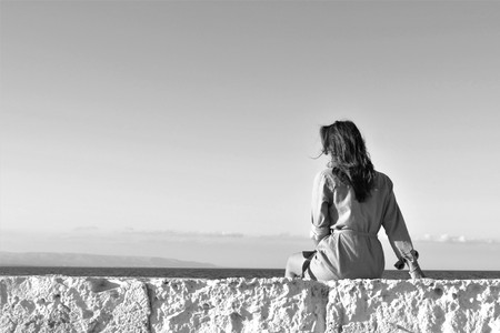 Woman watching the sea.
