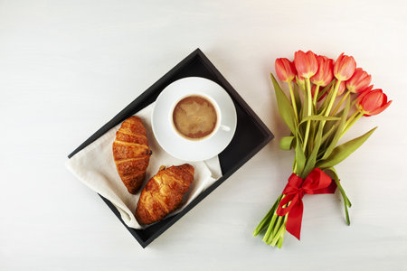 Flat lay with french style breakfast with coffee and croissants. Summer vacations , weekend in Paris conceptの写真素材