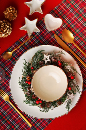 Mockup of festive decoration of christmas table for the party. Invitation, christmas celebration, festive dinner conceptの写真素材