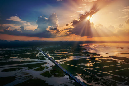 Aerial view of Chalerm Phra Kiat road at sunset in Thale Noi, Phatthalung, Thailandの写真素材