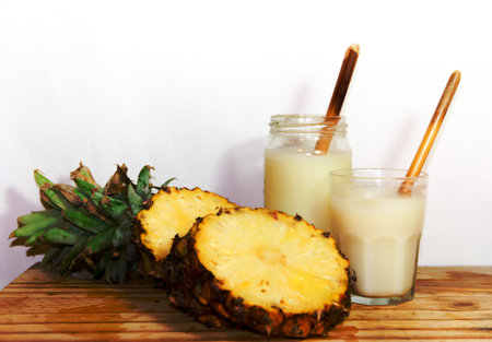 glasses with juice pineapple drinks and smoothies fresh pineappleの写真素材