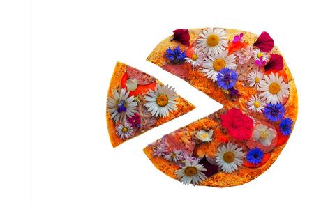 Creative pizza with a sliced slice topped with colorful flowers.の写真素材