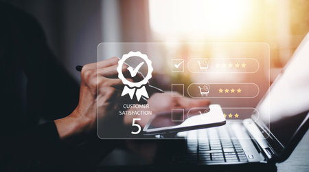 Hand touch smartphone with Customer review satisfaction feedback survey concept, User give rating to service experience on online application, service leading to reputation ranking of business.の写真素材