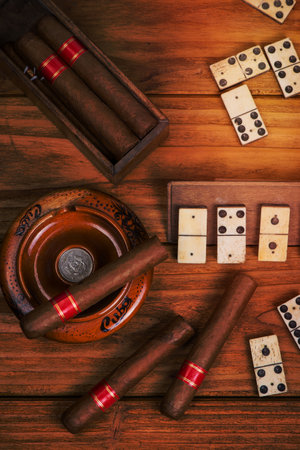 Cuban cigars and traditional domino gameの写真素材