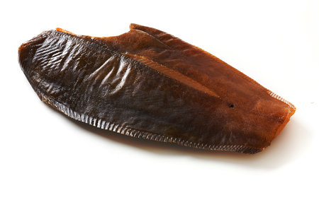 Atlantic salted whole smoked halibut isolated on white background. View from above.の写真素材