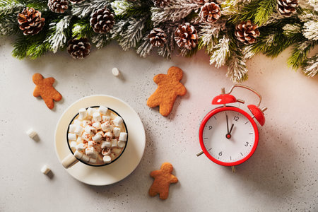Christmas chocolate, coffee with marshmallow, clock and Gingerbread man cookies on white background....