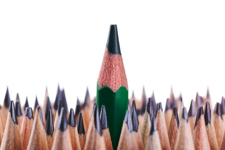 One sharpened green pencil among many onesの写真素材