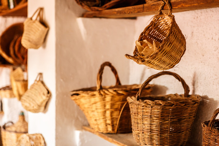 Set of different types of wicker baskets placed in different waysの写真素材