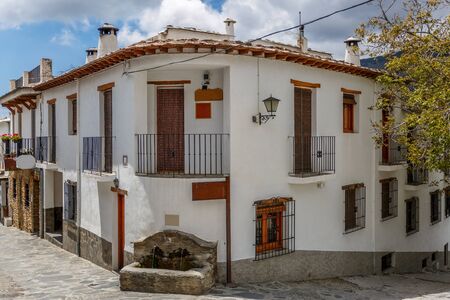 Beautiful view of a street corner of a village of La Alpujarra, Granada, Spainの写真素材