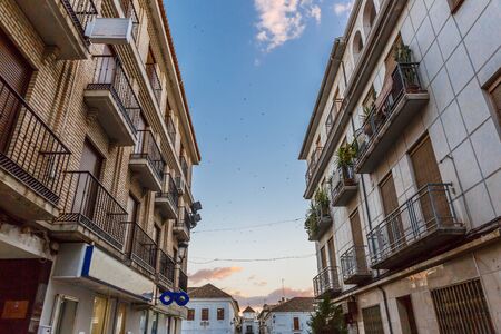 Small view of a street in the town of Santa Fe, Granada, Spainの写真素材