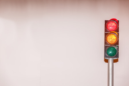 Semaphore placed on the right side, with a white wall in the background