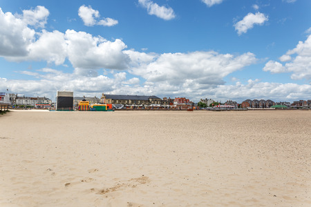 Great yarmouth beach with attractions in the background, Norfolk, UKの写真素材