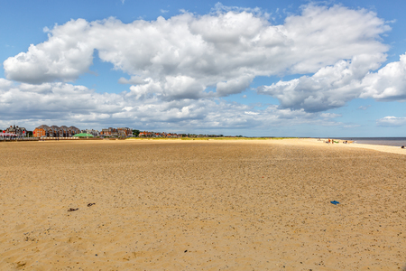 Landscape of the beautiful and quiet Great Yarmouth beach and the city in the background, UKの写真素材