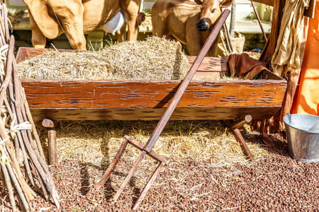 Close-up of representation of hay and some cows, at the time of the birth of Jesus Christ, Christmas.の写真素材