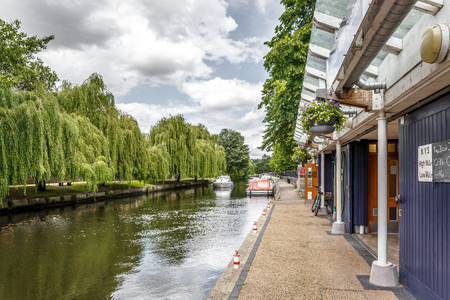 View of a small jetty on a beautiful river, Norwich, Englandのeditorial素材