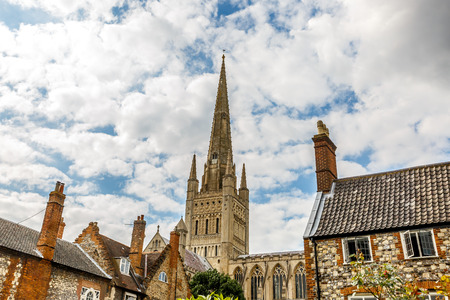 View of beautiful stone houses and a cathedral in the city of Norwich, England, UKの写真素材