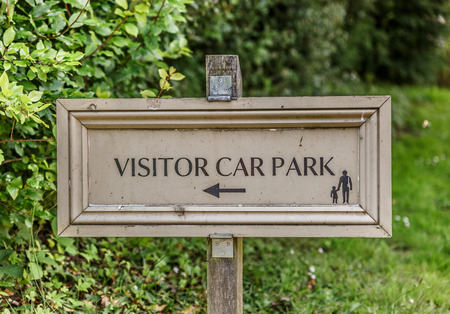 Placard in the middle of a natural space indicating where the visitor car park is, Englandの写真素材