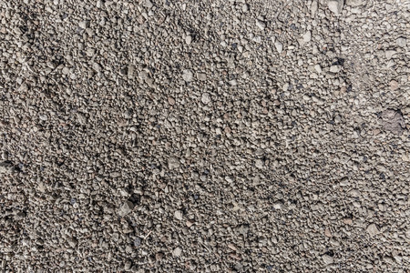 Rugged light gray background with some holes