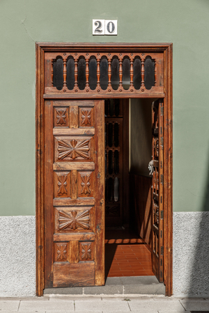 Vintage wooden door of a large house, with number 20 aboveのeditorial素材