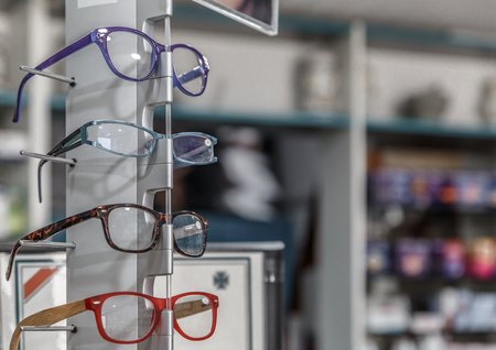 Glasses frames for sale in a pharmacyの写真素材