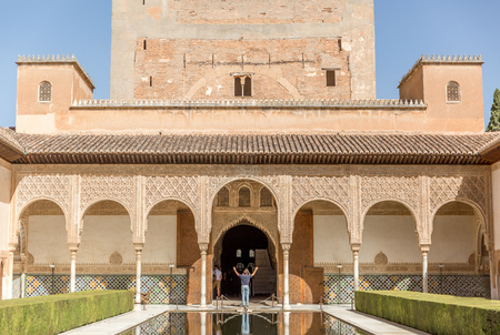 Picturesque myrtles court with facade of comares palace, king's residence, and its reflections in Alhambra, Spainのeditorial素材