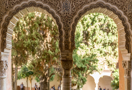 Muslim arch door in Alhambra area of Granada Spainの写真素材