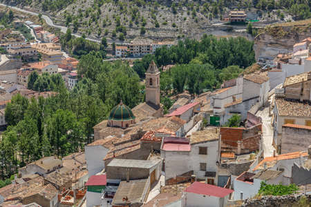 View of the church, the dome and the town Alcala del Jucar, in the province of Albacete in Spain with a Mediterranean climateのeditorial素材