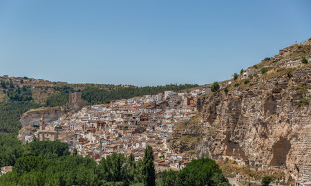 Beautiful panoramic view of the beautiful town Alcala del Jucar in Albacete, Spain on a summer dayのeditorial素材