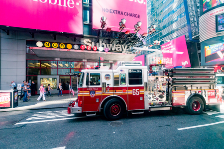 MANHATTAN, NEW YORK - SEPTEMBER 19: View of a fire truck at the Times Square on September 19, 2015....
