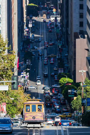 SAN FRANCISCO, CALIFORNIA - SEPTEMBER 17: View of the California Street in direction Downtown in San Francisco on September 17, 2015. This view provides a look to the Bay Bridge and the cable cars.のeditorial素材