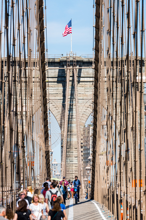 NEW YORK - AUGUST 22: Views of the Brooklyn Bridge on a summer day on August 22, 2015. Its a famous and iconic bridge in New York, which passes the east river.のeditorial素材