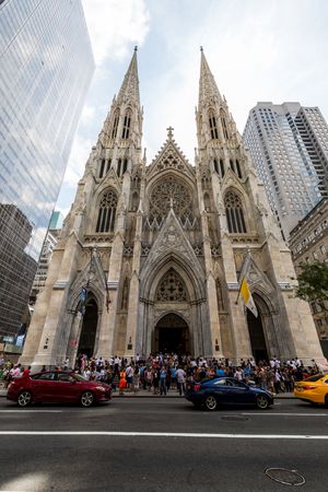âNEW YORK - AUGUST 23: View to the St. Patricks Cathedral in Midtown Manhattan with the famous 5th Avenue on August 23, 2015. Its a decorated Neo-Gothic-style Roman Catholic cathedral church.のeditorial素材