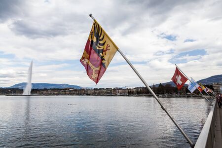 GENEVA, SWITZERLAND - APRIL 11: Exterior views of the buildings and fountain at the Geneva Lake on April 11, 2015. Its the second most populous city in Switzerland (after Zurich).のeditorial素材