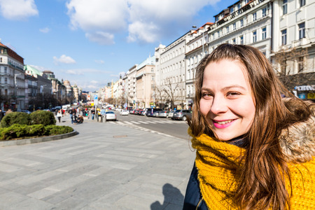 A girls at the Wenceslas Square in Pragueの写真素材