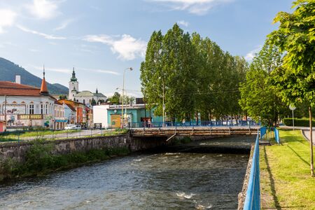 RUZOMBEROK, SLOVAKIA - JUNE 3, 2015: View to the buildings near Revuca river in the city center of Ruzomberok on June 3, 2015. Ruzomberok is a town in northern Slovakia, in the historical Liptov region.のeditorial素材