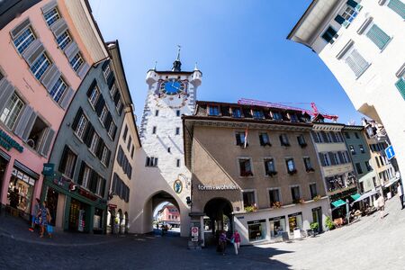 BADEN, AARGAU, SWITZERLAND - JUNE 30, 2015: Exterior views of the tower Stadtturm in Baden on June 30, 2015. Baden is a municipality in the Swiss canton of Aargau, located 25 km (16 mi) northwest of Zurich.のeditorial素材