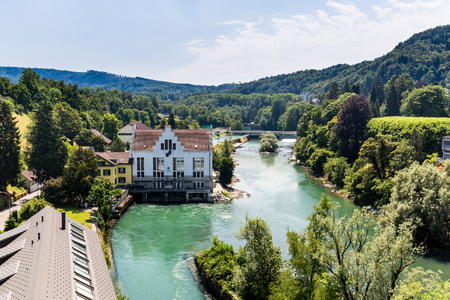 BADEN, AARGAU, SWITZERLAND - JULY 2, 2015: Exterior view of  the hydroelectric power station of Baden and the river Limmat on July 2, 2015. Baden is a municipality in the Swiss canton of Aargau.のeditorial素材
