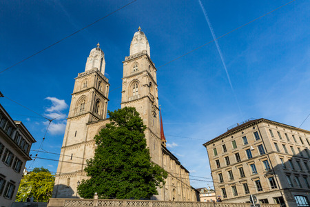 ZURICH, SWITZERLAND - MAY 17, 2015: Famous postcard view of various houses and churches in the old town part of Zurich at sunset on May 17, 2015. Zurich is the biggest city in Switzerland.のeditorial素材