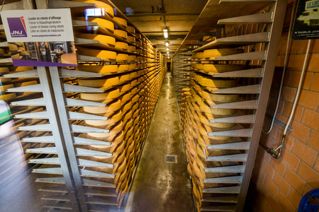 GRUYERES, SWITZERLAND - MAY 23, 2015: Interior view of a cheese diary in the historical town Gruyeres in the canton of Fribourg, Switzerland on May 23, 2015. Gruyere is a famous swiss cheese.のeditorial素材