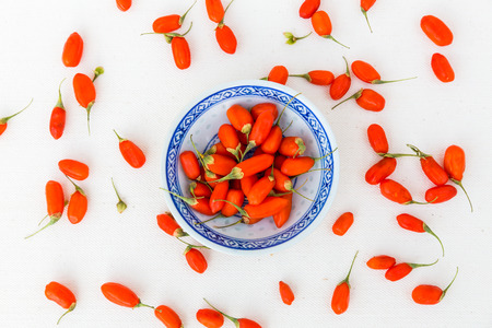 Detail view of arranged Goji berries on a white backgroundの写真素材