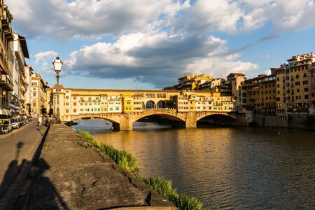 FLORENCE, ITALY - JULY 16, 2016: Viev of the Ponte Vecchio in Florence on July 16, 2017. Florence is the capitol city of the Tuscany region and very popular by tourist.のeditorial素材