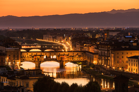 FLORENCE, ITALY - JULY 16, 2016: View of the Ponte Vecchio in Florence on July 16, 2016. Florence is the capitol city of the Tuscany region and very popular by tourist.のeditorial素材