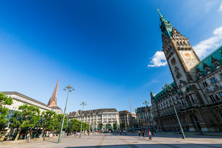 HAMBURG, GERMANY - JUNE 6, 2016: Exterior view of the Hamburg Rathaus and the Market Square in the city center of Hamburg on June 6, 2016. The town hall is the seat of the government of Hamburg.のeditorial素材