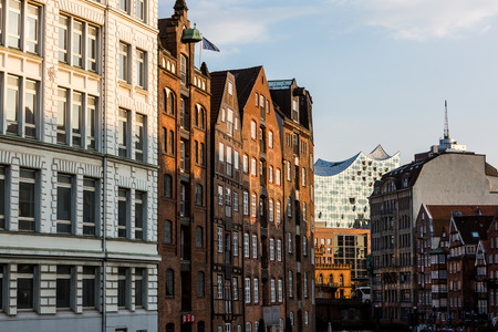 HAMBURG, GERMANY - JUNE 6, 2016: Typical view to the Speicherstadt from the Holzbrucke Bridge at Nikolaifleet in Hamburg on June 6, 2016. Its a popular harbour quarter for tourists in Hamburg.のeditorial素材
