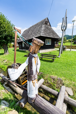 PODBIEL, SLOVAKIA - AUGUST 2, 2016: View of rural houses in the small town Podbiel on August 2, 2016. Its located in the north Slovakian region Orava and popular by tourist for its heritage houses.のeditorial素材