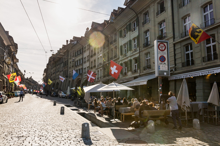 BERN, SWITZERLAND - APRIL 30, 2017: View of the Kramgasse Street towards the Zytglogge Tower (Clock tower) of Bern on April 30, 2017. Kramgasse (Grocers Alley) is one of the principal streets in Bern.のeditorial素材
