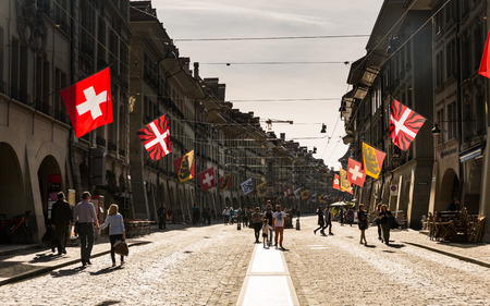 BERN, SWITZERLAND - APRIL 30, 2017: View of the Kramgasse Street towards the Zytglogge Tower (Clock tower) of Bern on April 30, 2017. Kramgasse (Grocers Alley) is one of the principal streets in Bern.のeditorial素材