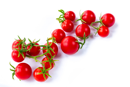 Bunch of tomatoes on white backgroundの写真素材