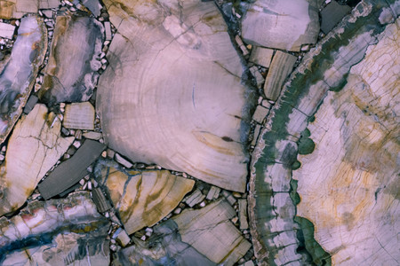 Natural stone glass background pattern of multicolored round pieces